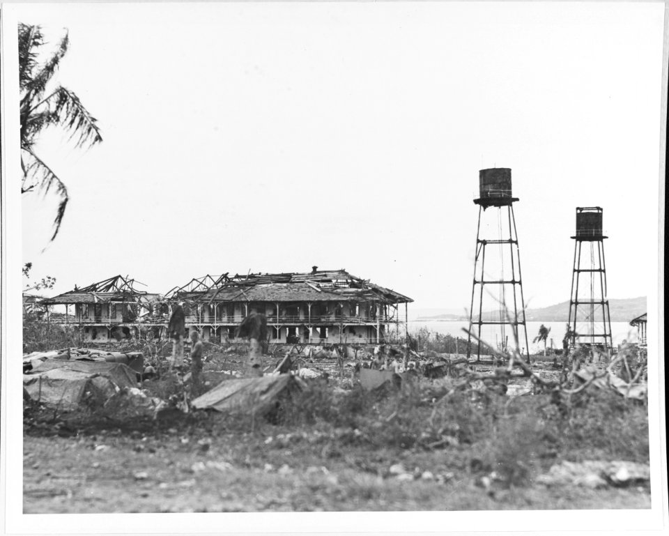 Damaged buildings at Sumay, 1 August 1944