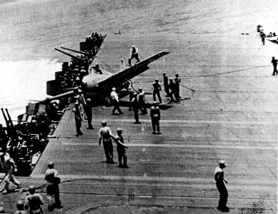 Damaged Grumman F4F-4 Wildcat of VF-72 after landing aboard USS Enterprise (CV-6) on 26 October 1942 (80-G-42562) photo