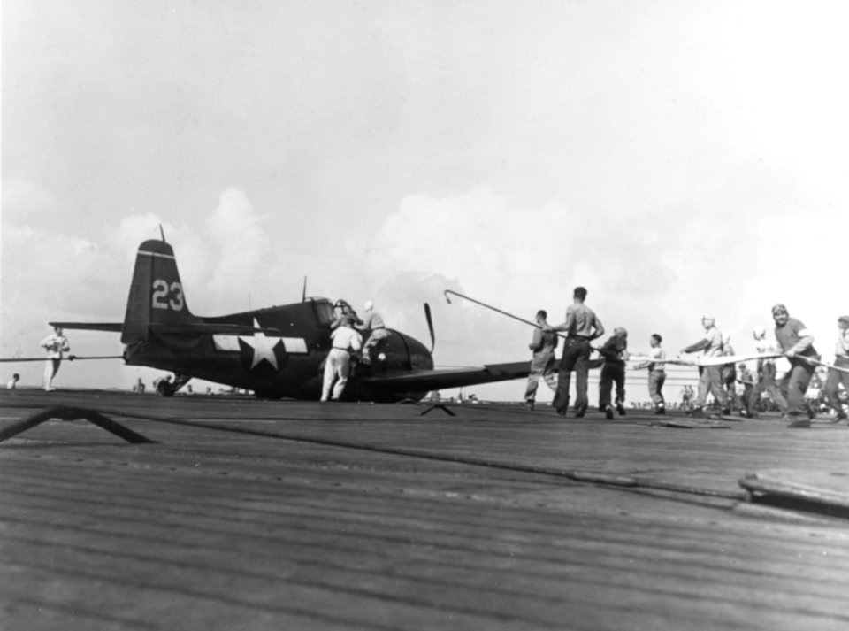 Damaged F6F of VF-15 after crash landing on USS Essex (CV-9) in May 1944
