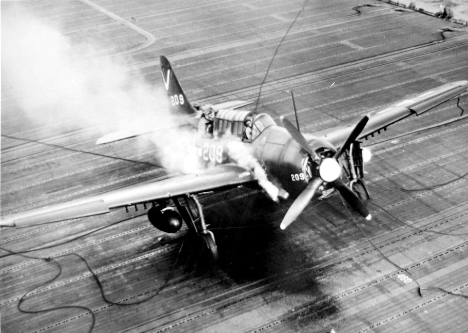 Damaged SB2C-4E landing on USS Ticonderoga (CV-14) in 1945