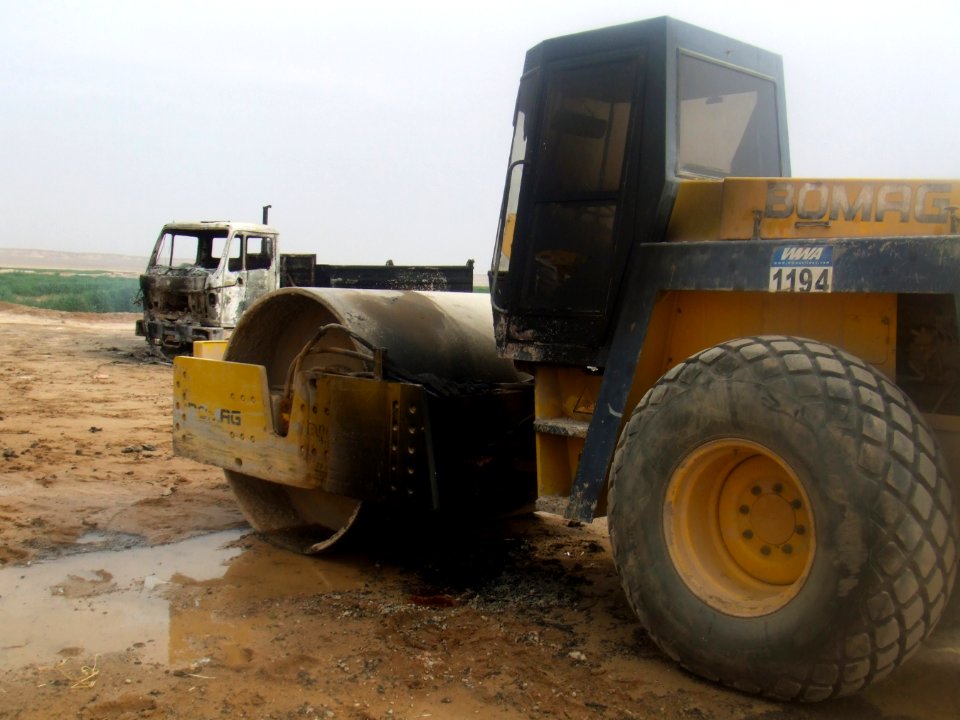 Damaged BOMAG road roller in Afghanistan