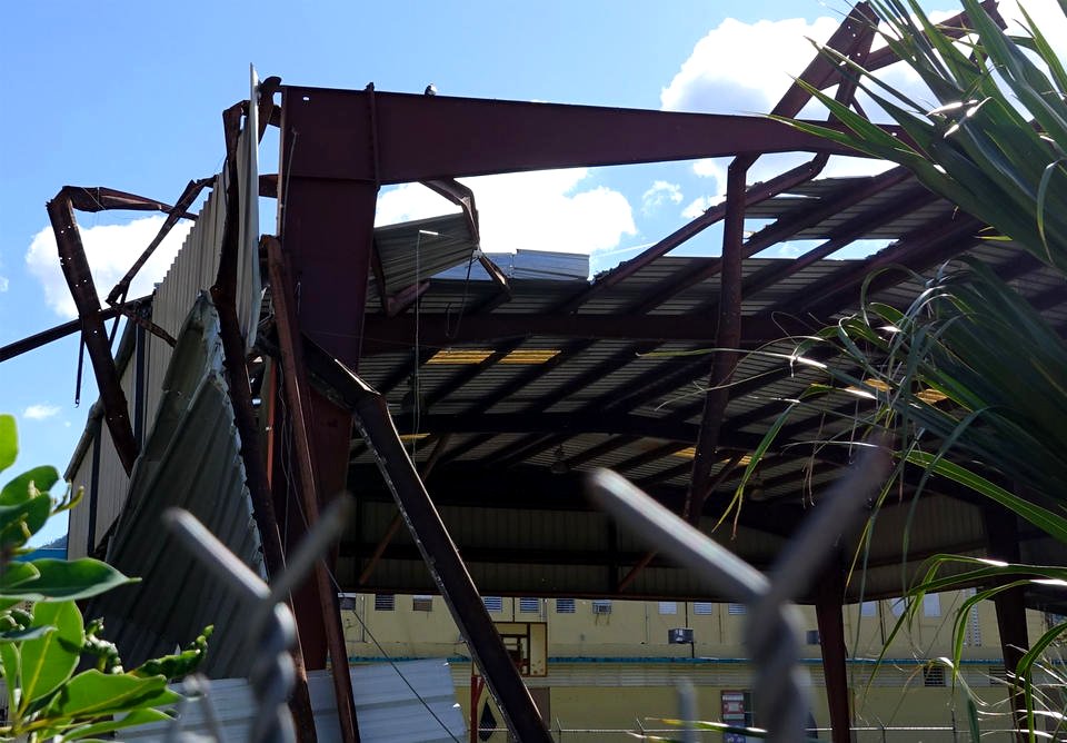 Damaged structure over a basketball court in Cayey, Puerto Rico after Hurricane Maria