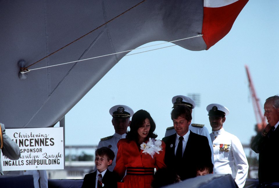 Dan Quayle his wife, Marilyn, and their children stand on the christening platform of the USS VINCENNES