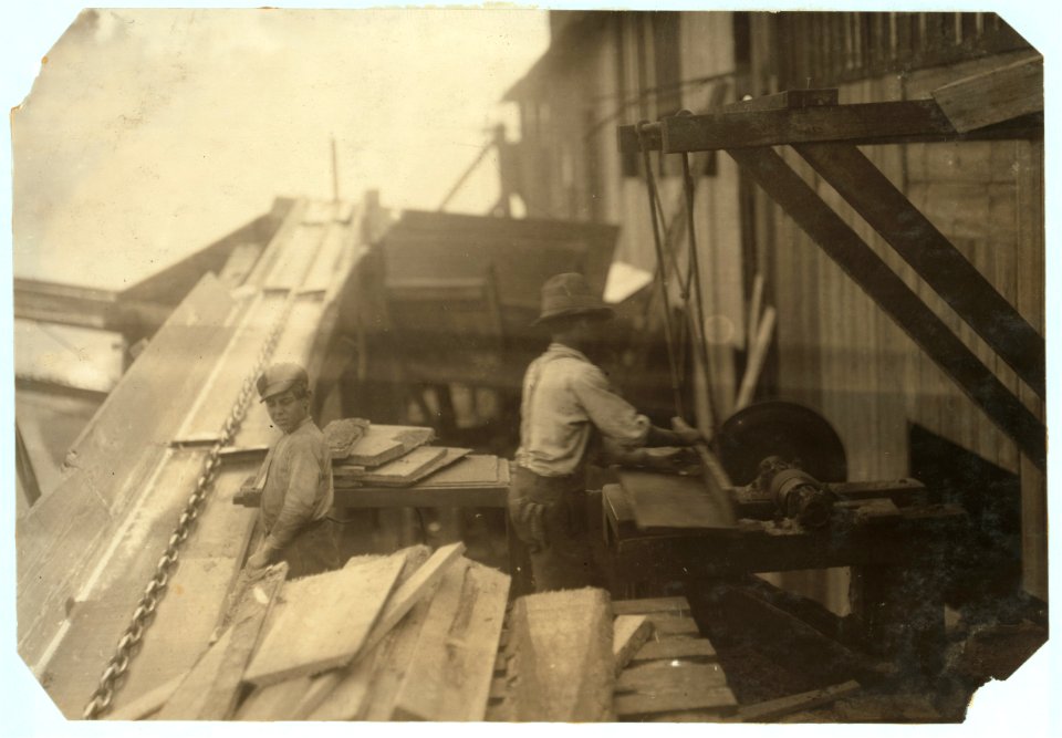 Dangerous work. Charlie McBride. Said twelve years old. This twelve year old boy has a steady job with the Miller and Vidor Lumber Company. He takes slabs out of the chute which has a moving LOC nclc.05546