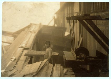 Dangerous work. Charlie McBride. Said twelve years old. This twelve year old boy has a steady job with the Miller & Vidor Lumber Company. He takes slabs out of a chute which has a moving LOC cph.3a20816