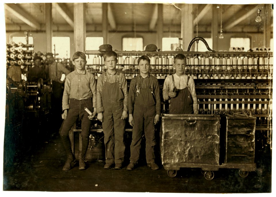 Daniel Mfg. Co., Lincolnton, N.C. Four doffers. Boy on left end (knee pants) said he had worked in mills for 7 years and some nights. At nights they work 12 hours, without any hour off for LOC nclc.01378