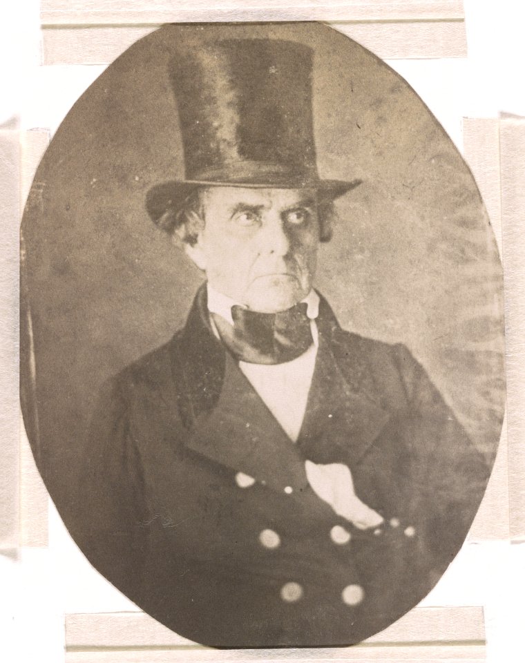 Daniel Webster, half-length studio portrait, facing slightly right, wearing top hat and coat LCCN2015651557