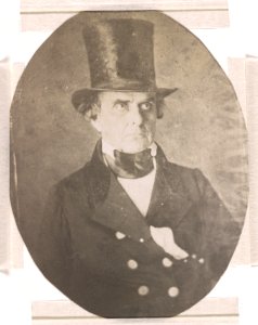 Daniel Webster, half-length studio portrait, facing slightly right, wearing top hat and coat LCCN2015651557