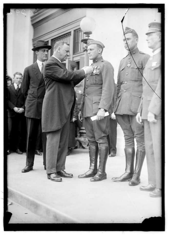 DANIELS, JOSEPHUS. SECRETARY OF THE NAVY, 1913-1921. DECORATING MARINE HEROES LCCN2016869937