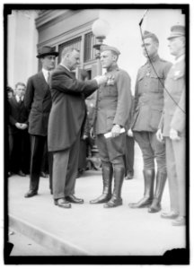 DANIELS, JOSEPHUS. SECRETARY OF THE NAVY, 1913-1921. DECORATING MARINE HEROES LCCN2016869937