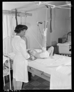 Daughter of miner employed by the company who is a patient in this hospital. She is recovering from a fractured leg.... - NARA - 540447