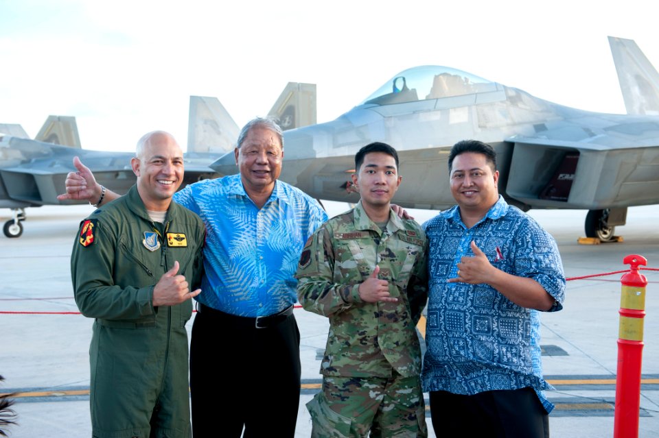 David Apatang Standing with USAF Airmen