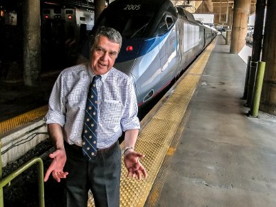 David Gunn, President and CEO of Amtrak, on Acela train platform at Washington's Union Station photo