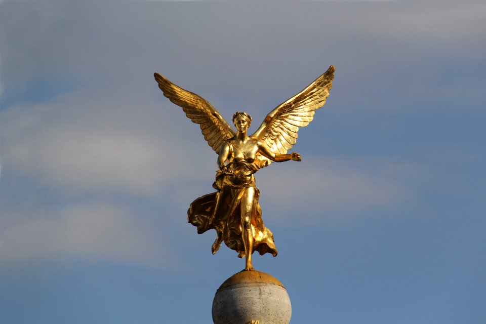 Woman gold victory statue