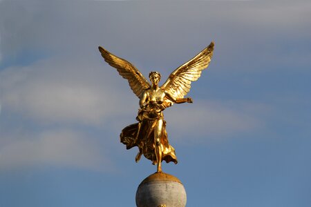 Woman gold victory statue