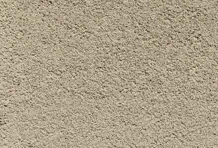 Scratch plaster textured plaster wall