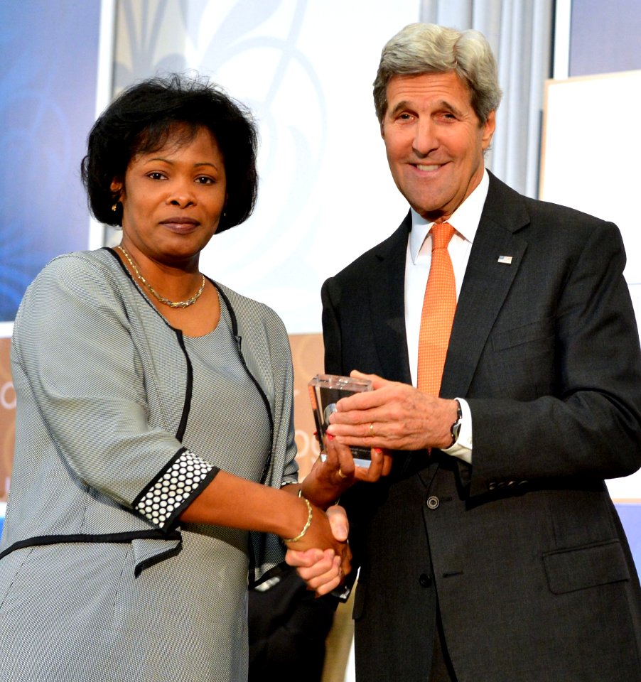 Debra Baptist-Estrada of Belize and U.S. Secretary of State John Kerry - IWOC 2016
