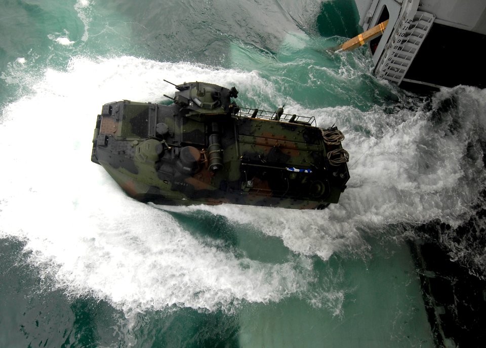 Defense.gov News Photo 100707-N-8283S-116 - A U.S. Marine Corps amphibious assault vehicle launches from the well deck of the amphibious assault ship USS Boxer LHD 4 in the Pacific Ocean on