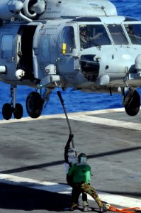 Defense.gov News Photo 100715-N-7605J-172 - U.S. Navy sailors attach a cargo pendant to an HH-60H Seahawk helicopter assigned to Helicopter Anti-Submarine Squadron 4 during a vertical