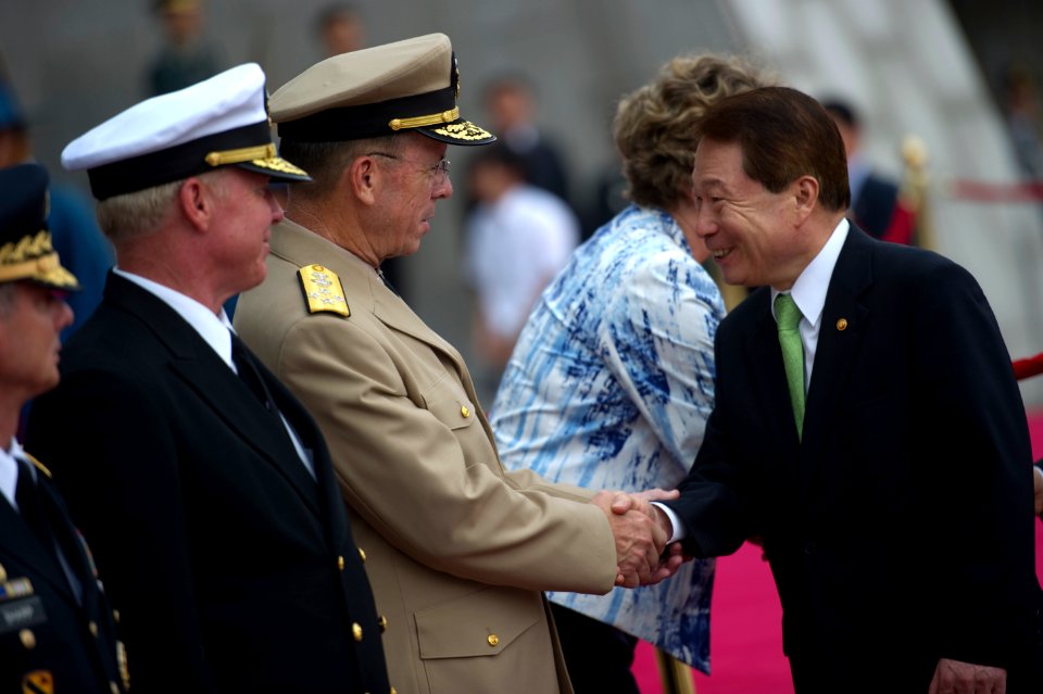 Defense.gov News Photo 100721-N-0696M-366 - Chairman of the Joint Chiefs of Staff Adm. Mike Mullen greets South Korean Foreign Minister Yu Myung-hwan during a memorial ceremony at the War