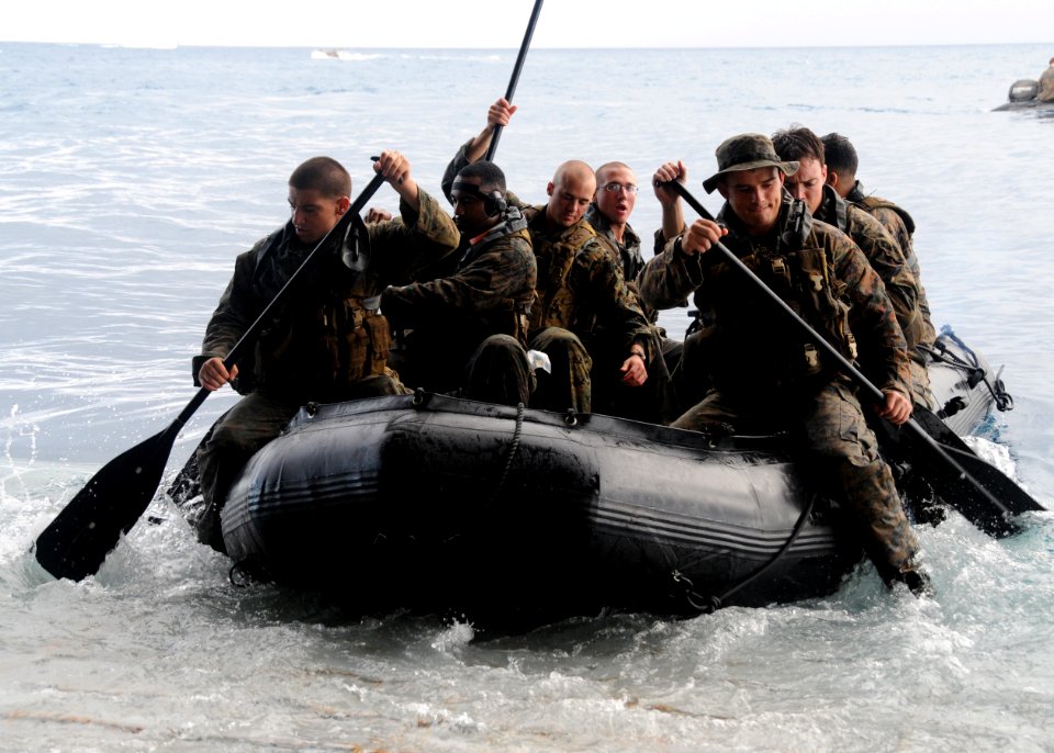 Defense.gov News Photo 100909-N-0120A-043 - U.S. Marines assigned to the 31st Marine Expeditionary Unit and embarked aboard the USS Essex LHD 2 ride in a combat rubber raiding craft after
