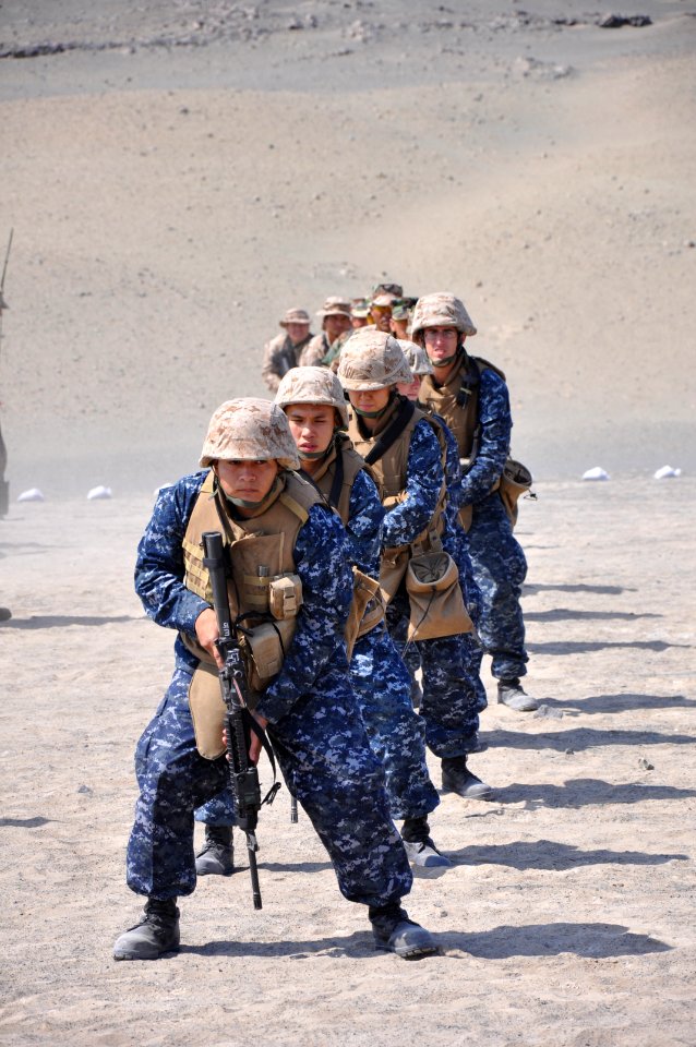 Defense.gov News Photo 100710-N-6199O-022 - U.S. Navy sailors and Marines assigned to the USS New Orleans LPD 18 along with Peruvian soldiers prepare to turn and fire on a gun range