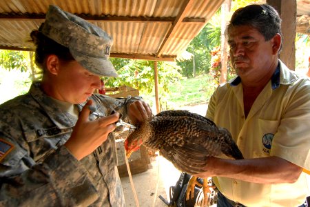 Defense.gov News Photo 100908-N-7680E-261 - U.S. Army Capt. Rebecca Carden left a veterinarian with South Plains Veterinary Services Fort Sam Houston Texas embarked aboard the photo