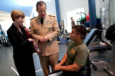 Defense.gov News Photo 100930-N-0696M-108 - Chairman of the Joint Chiefs of Staff Adm. Mike Mullen U.S. Navy and his wife Deborah talk with U.S. Marine Cpl. Raul Olivares during a visit to