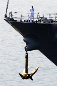 Defense.gov News Photo 100803-N-7783B-011 - A U.S. Navy sailor mans the rails of the guided missile destroyer USS Kidd DDG 100 as it arrives in Seattle to participate in the 61st annual