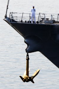 Defense.gov News Photo 100803-N-7783B-011 - A U.S. Navy sailor mans the rails of the guided missile destroyer USS Kidd DDG 100 as it arrives in Seattle to participate in the 61st annual photo