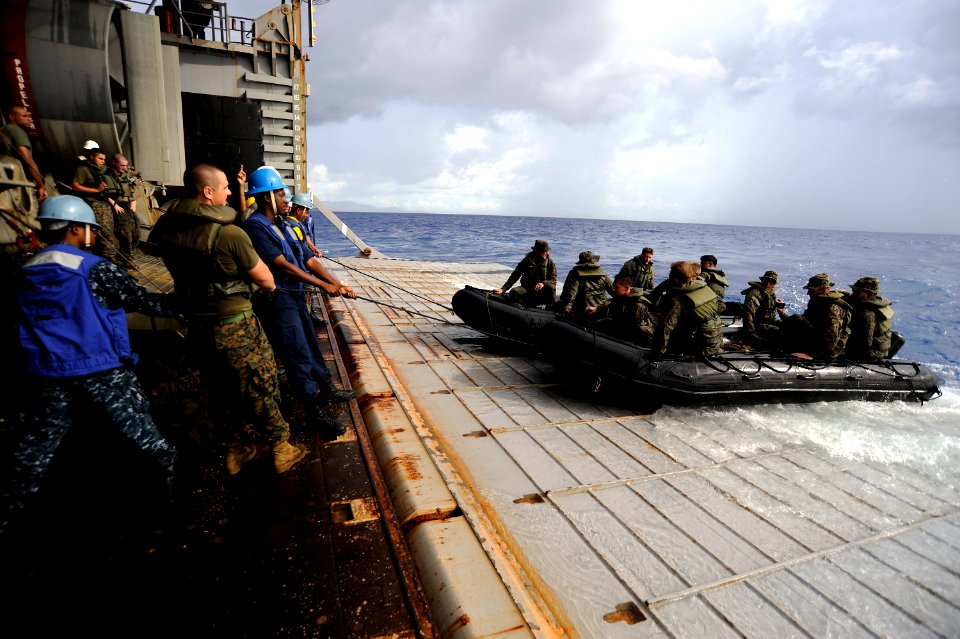 Defense.gov News Photo 100919-N-8335D-558 - U.S. Navy sailors and Marines recover combat rubber reconnaissance craft manned by Marines assigned to the 31st Marine Expeditionary Unit at the