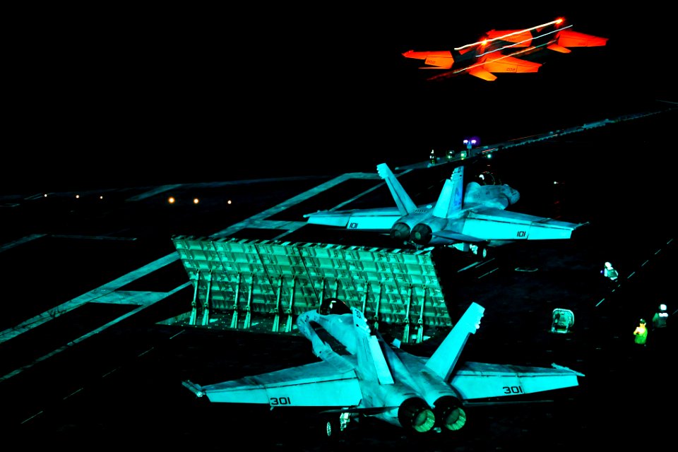 Defense.gov News Photo 101101-N-2821G-162 - An F A-18E Super Hornet launches from the aircraft carrier USS Abraham Lincoln CVN 72 during night flight operations in the Gulf of Oman on Nov. 1
