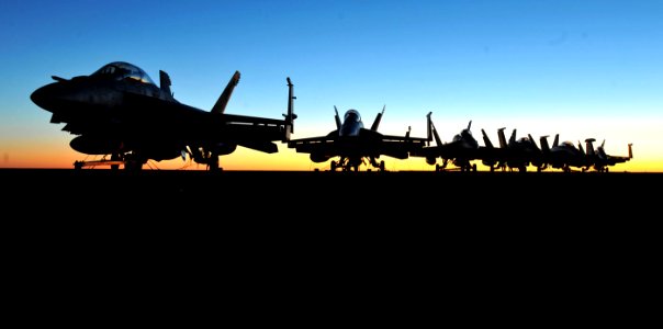 Defense.gov News Photo 101017-N-3374C-005 - U.S. Navy aircraft assigned to Carrier Air Wing Eight are parked on the flight deck of the aircraft carrier USS George H.W. Bush CVN 77 while
