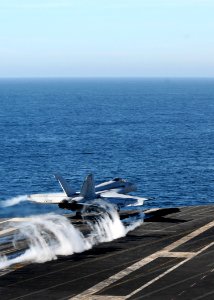 Defense.gov News Photo 101114-N-4005H-120 - An F A-18E Super Hornet assigned to Strike Fighter Squadron 147 launches from the aircraft carrier USS Ronald Reagan CVN 76 after completing a