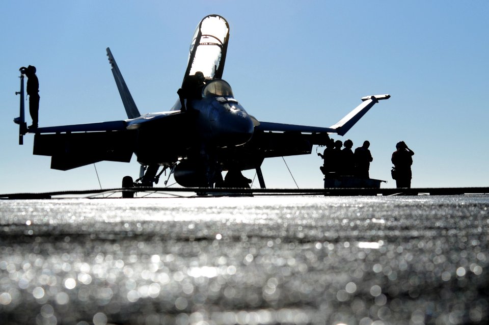 Defense.gov News Photo 101102-N-9132C-132 - U.S. Navy sailors assigned to Strike Fighter Squadron 154 prepare a Navy F A-18F Super Hornet aircraft for the first launch cycle of the day aboard