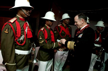 Defense.gov News Photo 101109-N-0696M-114 - Chairman of the Joint Chiefs of Staff Adm. Mike Mullen U.S. Navy greets Tongan Honor Guard soldiers during a visit to the kingdom on Nov. 9