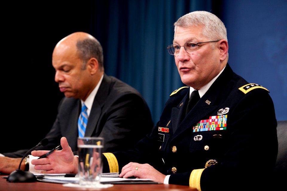 Defense.gov News Photo 101130-N-0696M-119 - Department of Defense General Counsel Jeh C. Johnson and U.S. Army Gen. Carter Ham conduct a press briefing in the Pentagon discussing the public