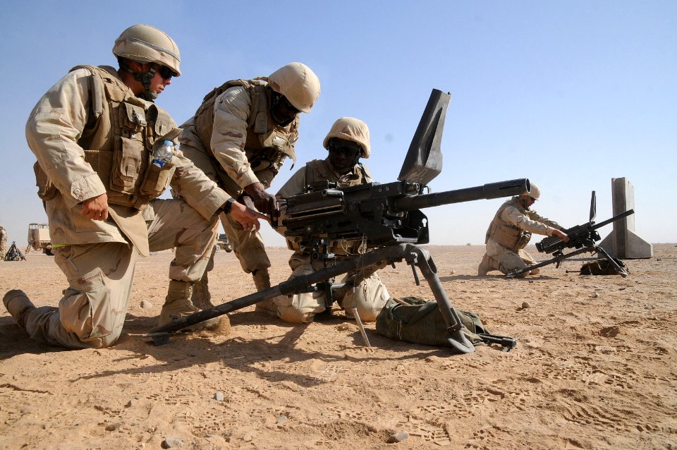 Defense.gov News Photo 101016-N-0475R-140 - U.S. Navy Seabees with Naval Mobile Construction Battalion 5 setup MK-19 grenade launchers during a crew-served weapons qualification range at Camp