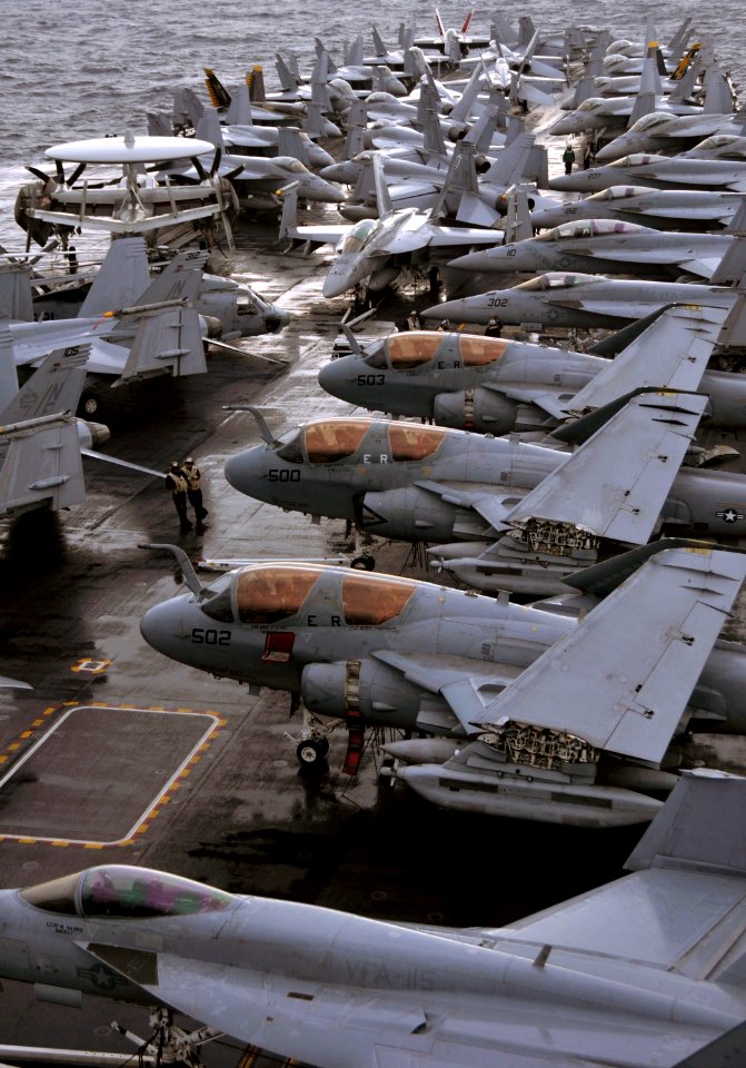 Defense.gov News Photo 101202-N-7103C-346 - Aircraft are secured to the bow of the aircraft carrier USS George Washington CVN 73 during a vertical replenishment operation on Dec. 2 2010. The