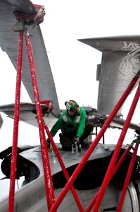Defense.gov News Photo 101207-N-1722W-025 - Petty Officer 3rd Class Shawn Grothaus conducts preflight checks on an MH-60S Seahawk helicopter attached to Helicopter Sea Combat Squadron 23 on