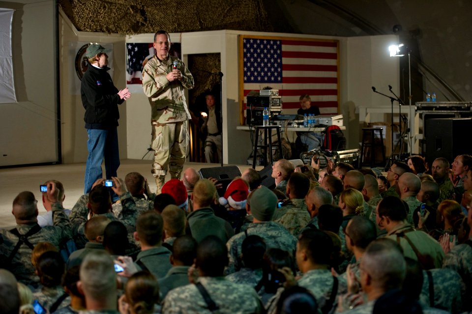 Defense.gov News Photo 101215-N-0696M-086 - Chairman of the Joint Chiefs of Staff Adm. Mike Mullen U.S. Navy and his wife Deborah introduce the performers during the USO Holiday Show at