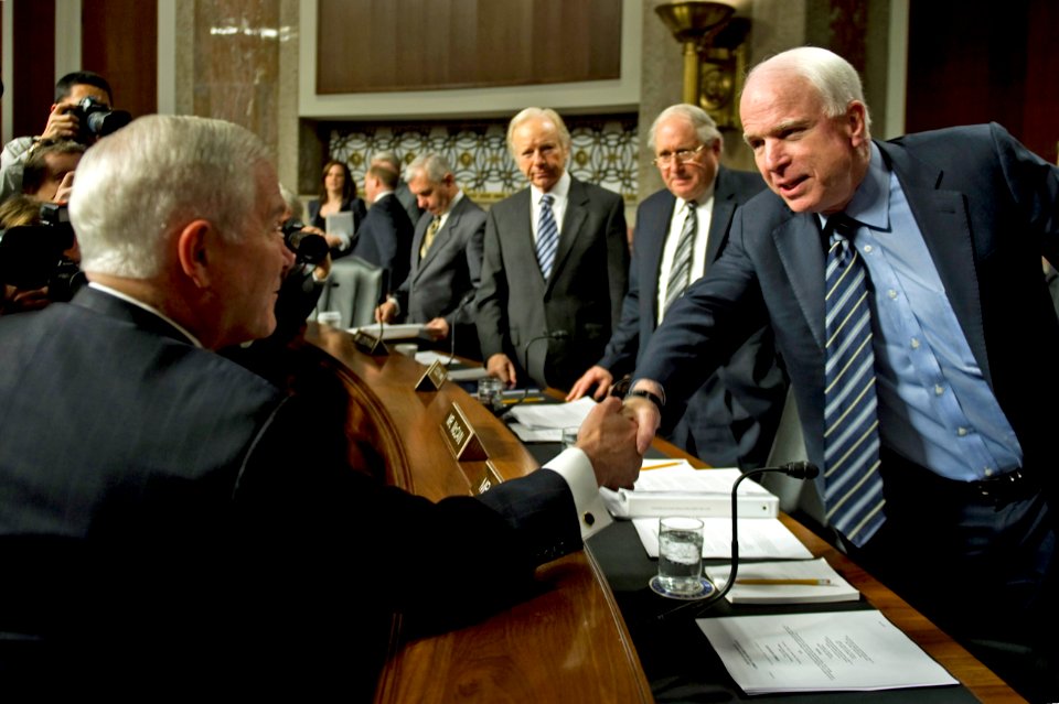 Defense.gov News Photo 101202-N-0696M-047 - Secretary of Defense Robert M. Gates greets Sen. John McCain prior to testimony before the Senate Armed Services Committee on Dec. 2 2010. Gates