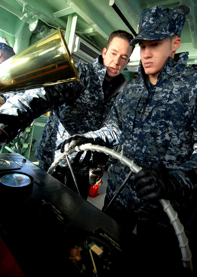 Defense.gov News Photo 110113-N-3857R-002 - U.S. Navy Seaman Apprentice Jacob Horsch right assigned to Yard Patrol Operations at the U.S. Naval Academy receives instruction from Petty