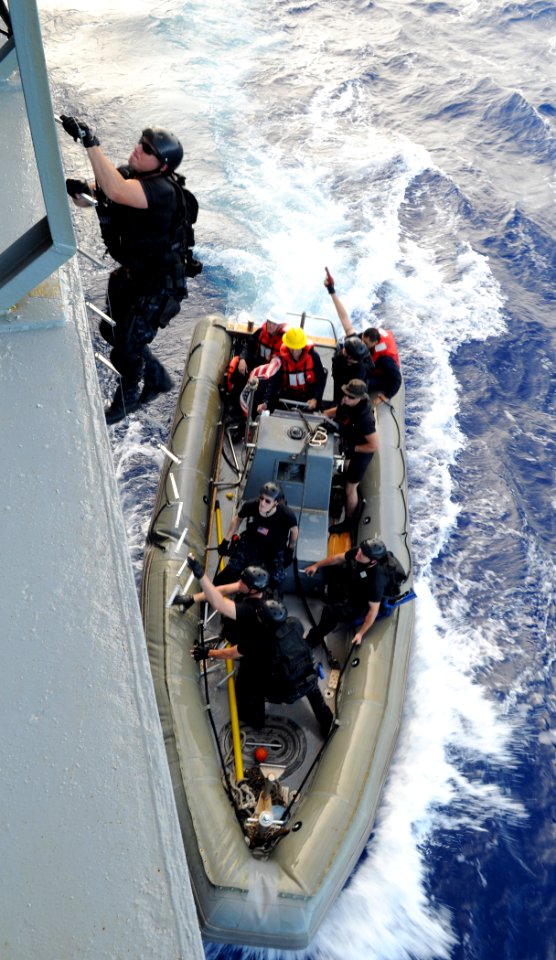 Defense.gov News Photo 101115-N-3666S-055 - U.S. Navy sailors with a visit board search and seizure team from the guided-missile frigate USS Reuben James FFG 57 board the fleet