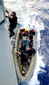 Defense.gov News Photo 101115-N-3666S-055 - U.S. Navy sailors with a visit board search and seizure team from the guided-missile frigate USS Reuben James FFG 57 board the fleet