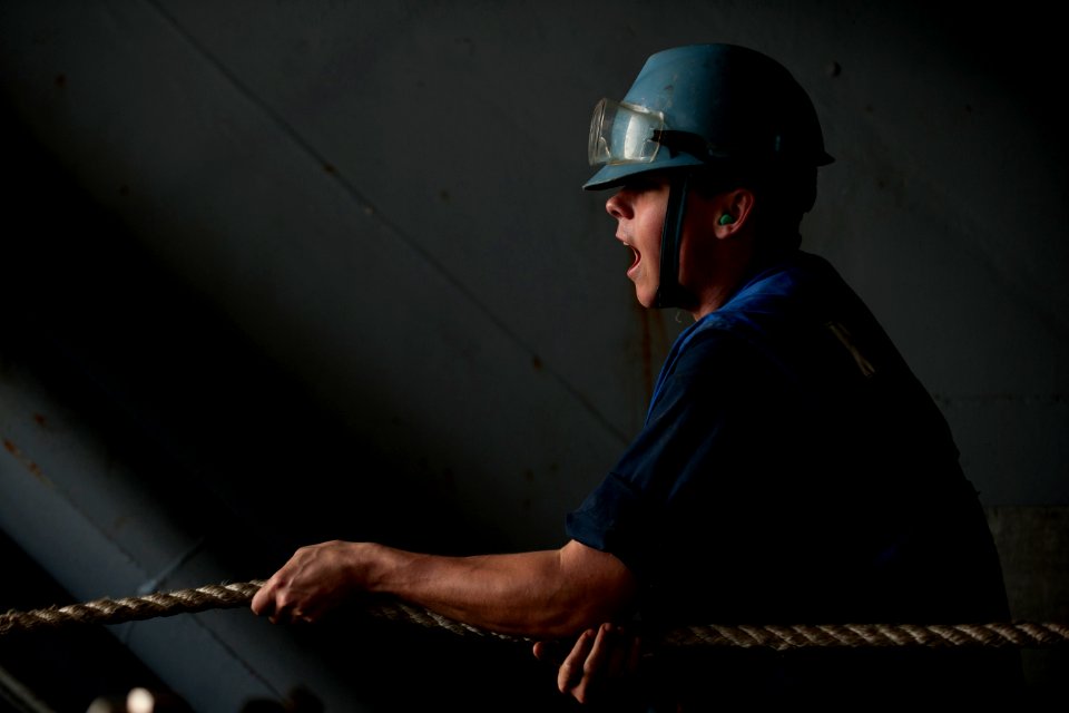 Defense.gov News Photo 110105-N-7981E-064 - U.S. Navy Petty Officer 3rd Class Troy Loveday assigned to the deck department of the aircraft carrier USS Carl Vinson CVN 70 repeats line