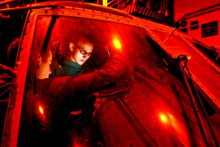 Defense.gov News Photo 101203-N-7422B-061 - U.S. Navy Airman Joseph Clemson troubleshoots electronics on an SH-60F Seahawk helicopter aboard the aircraft carrier USS Carl Vinson CVN 70 in the