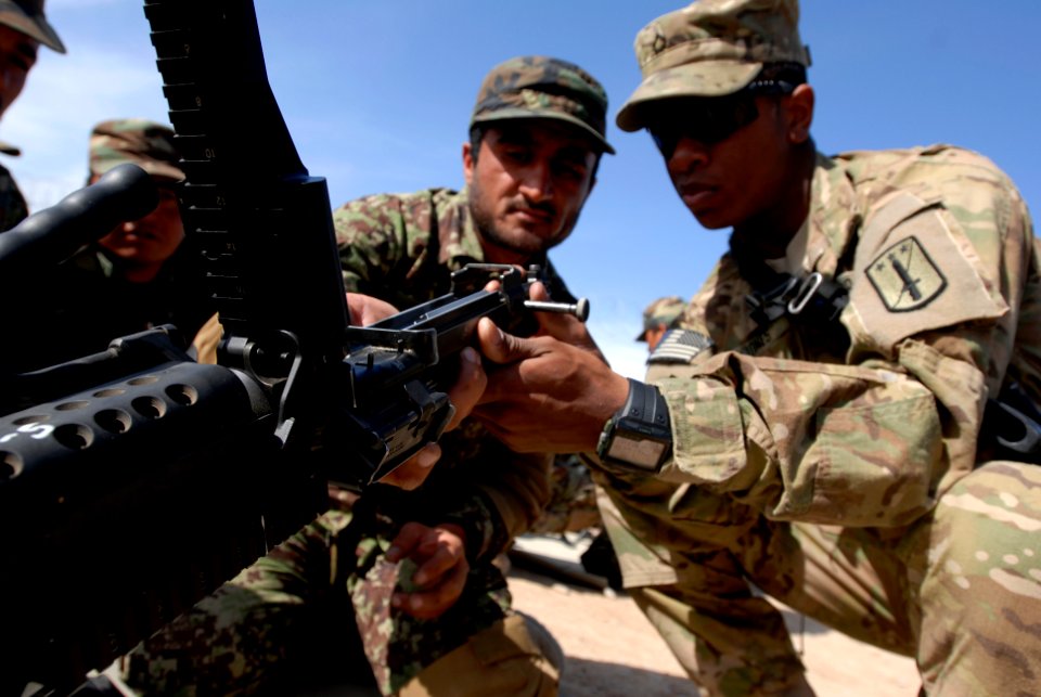 Defense.gov News Photo 110221-N-IT566-012 - U.S. Army Pfc. Jeremiah Jones right with Bravo Company 3rd Battalion 4th Infantry Regiment 170th Infantry Brigade shows an Afghan National