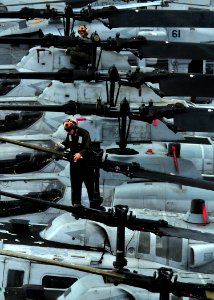 Defense.gov News Photo 110224-N-ZS026-282 - Marines conduct routine maintenance on helicopters assigned to Marine Medium Squadron 163 aboard the amphibious assault ship USS Boxer LHD 4