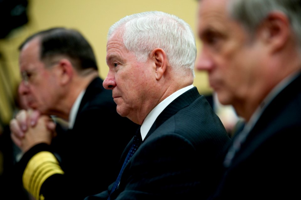 Defense.gov News Photo 110302-N-TT977-145 - Chairman of the Joint Chiefs of Staff Adm. Mike Mullen left Secretary of Defense Robert M. Gates and Under Secretary of Defense for Comptroller